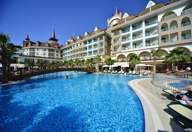 Самолетна почивка в Турция! 7 нощувки на човек на база All inclusive в Side Crown Palace 0*, Сиде, Турска ривиера с двупосочен чартърен полет от Варна - Снимка